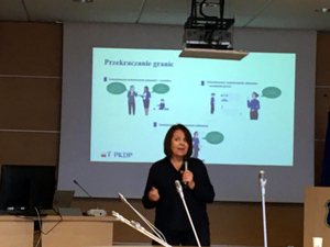 Prelegenci podczas wystąpienia na konferencji